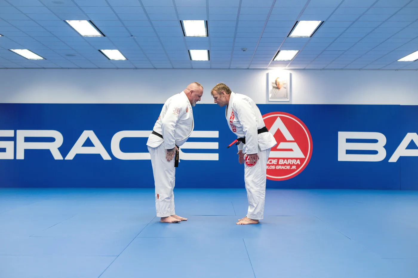 Two adult students bowing before a Jiu-Jitsu session at Gracie Barra Neepsend
